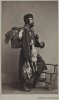 Уличный торговец дичью Россия, 1860-ые гг. Фотограф Каррик В.А. 1827-1878.jpg